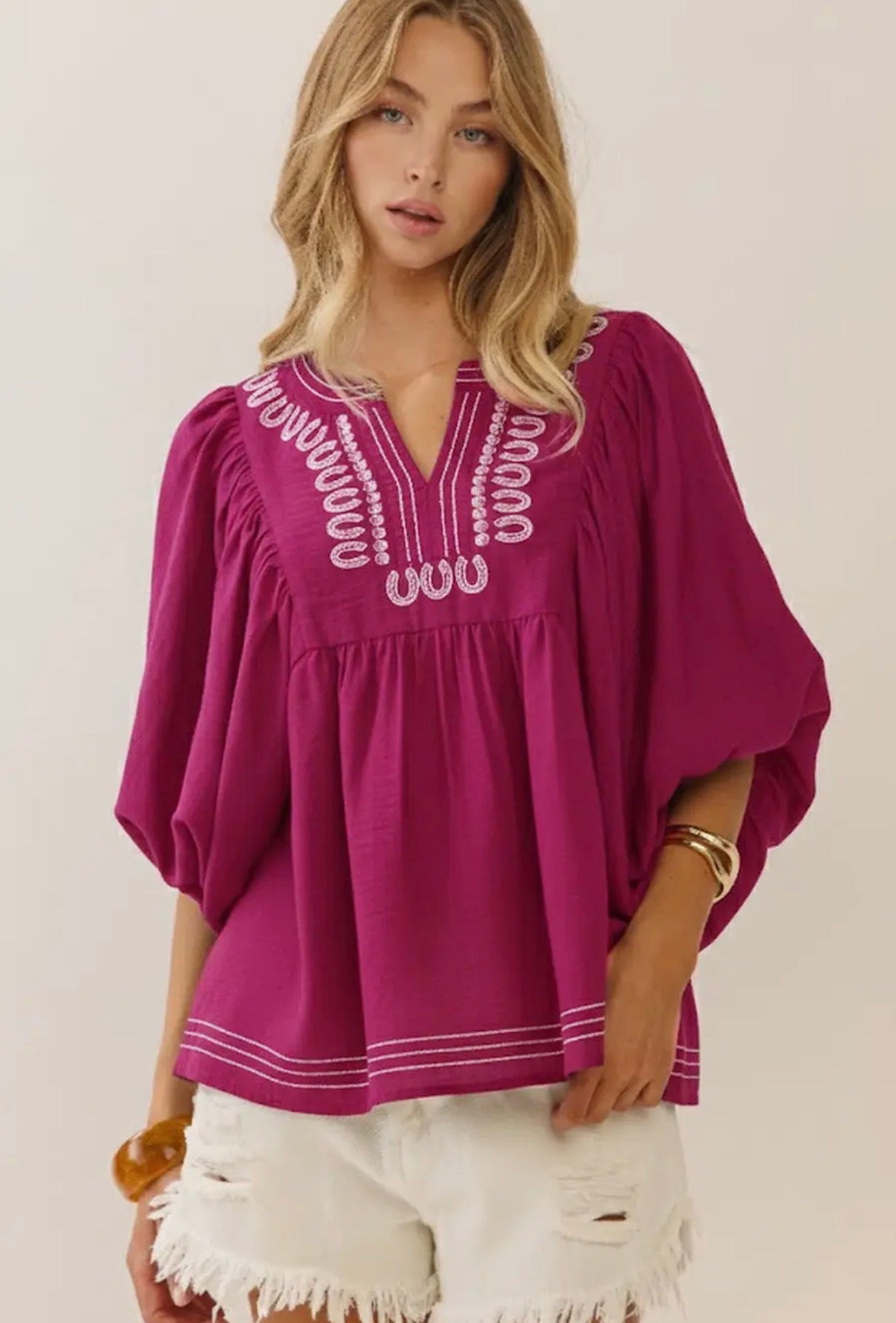 Embroidered curvy v-neck blouse