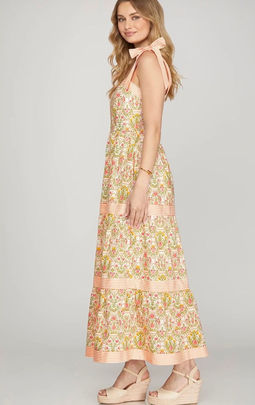 Peaches and pink dress