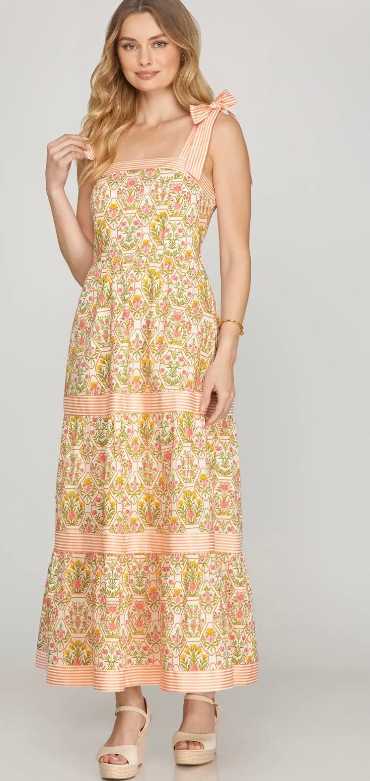 Peaches and pink dress