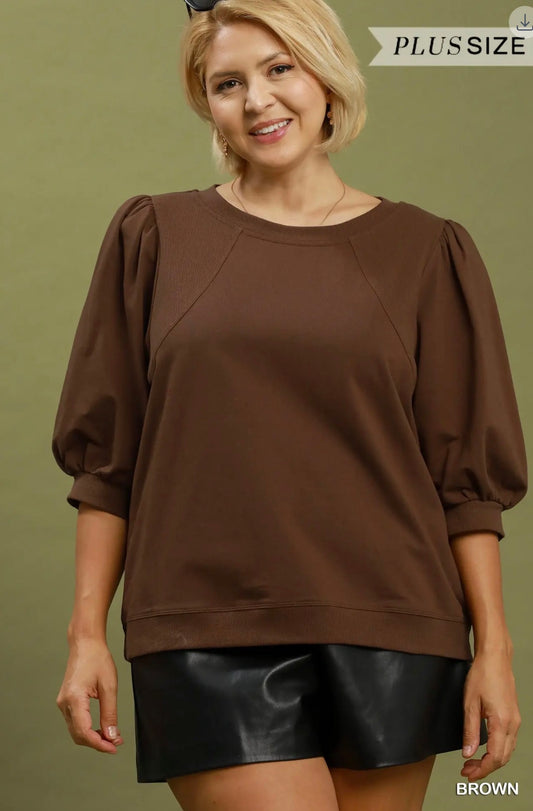 Brown curvy top